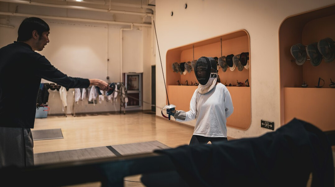 Workshop training room with people practicing scenarios